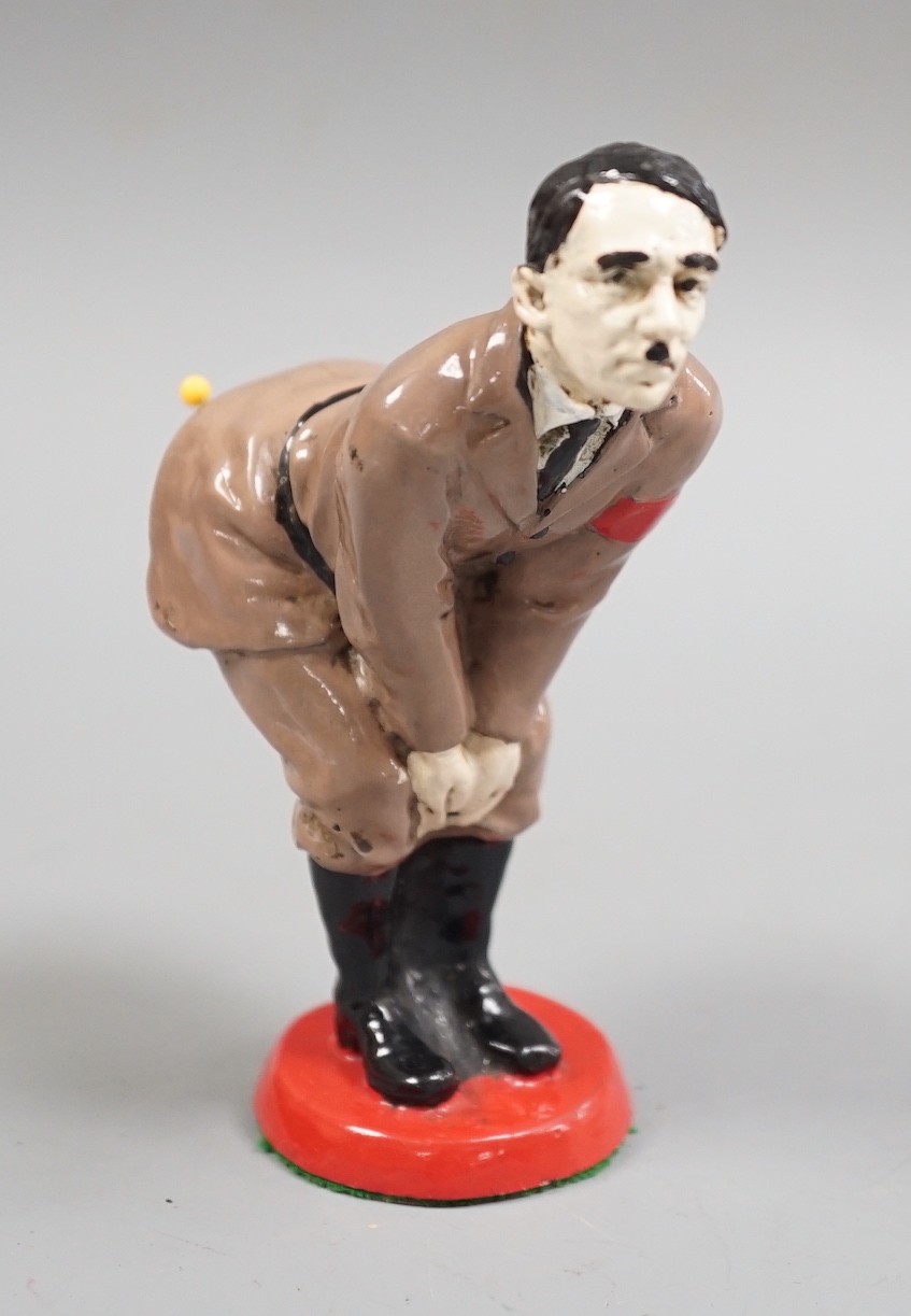 A painted metal ‘Adolf Hitler’ pin-cushion, 12cm